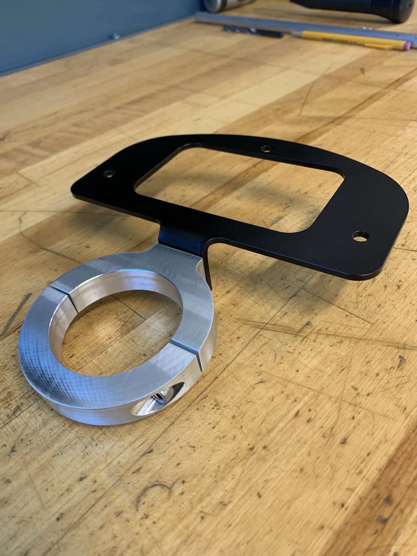 One-off machined ring and black mounting plate