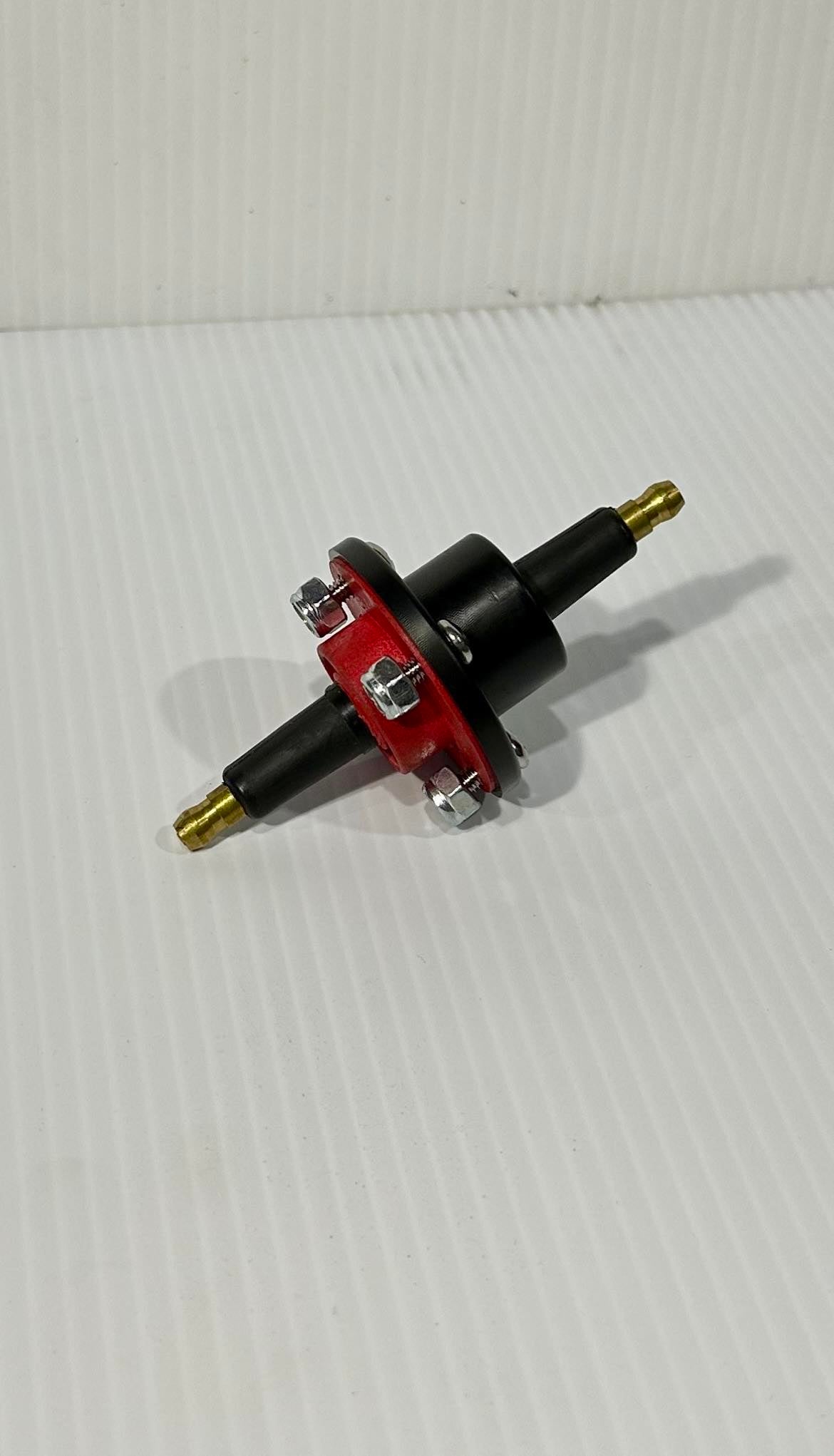 Black Delrin coil firewall feed-through cover